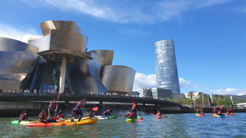 Canoeing next to the Guggenheim Bilbao.