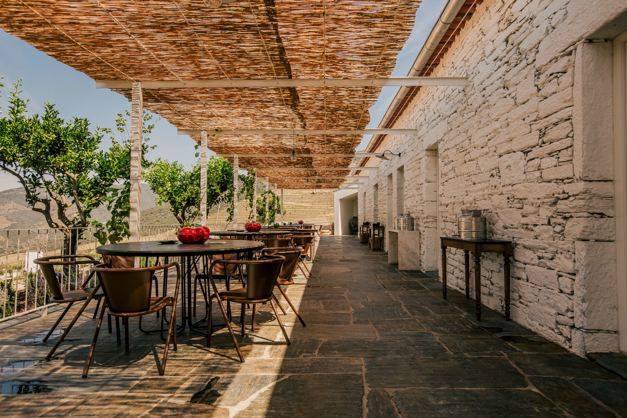 Shaded restaurant terrace at Ventozelo Hotel & Quinta in Portugal's Douro Valley